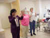 Dr. Kulkarni Caroline and Helen Chicken Dance for Madisons End of Chemo Party.jpg (144203 bytes)